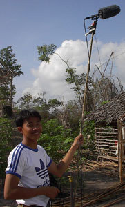 Cambodia Filmmaker holding a boom